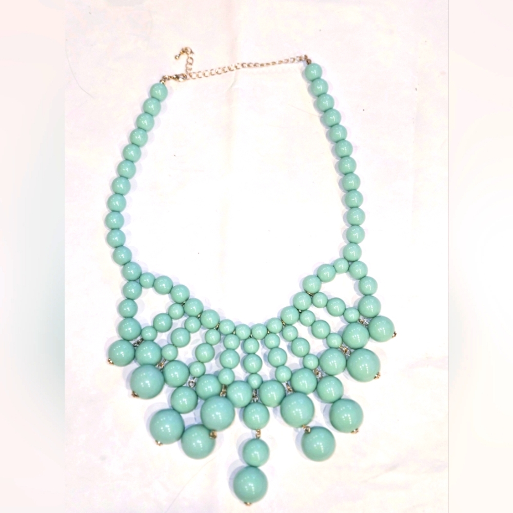 Mint green statement necklace. Approximately 11" long.